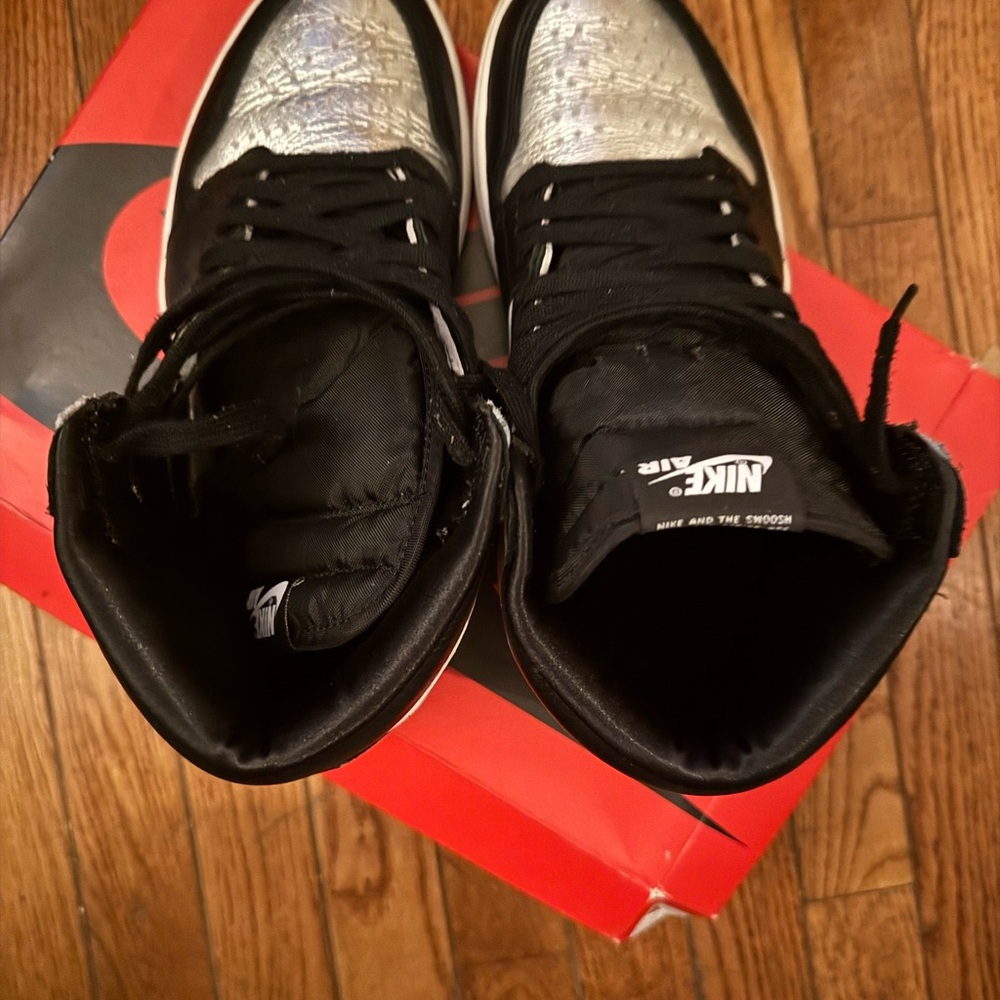 Nike Air Black and Metallic Silver Sneakers